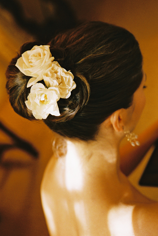 wedding hairstyle with fresh flowers photo by Yvette Roman Photography